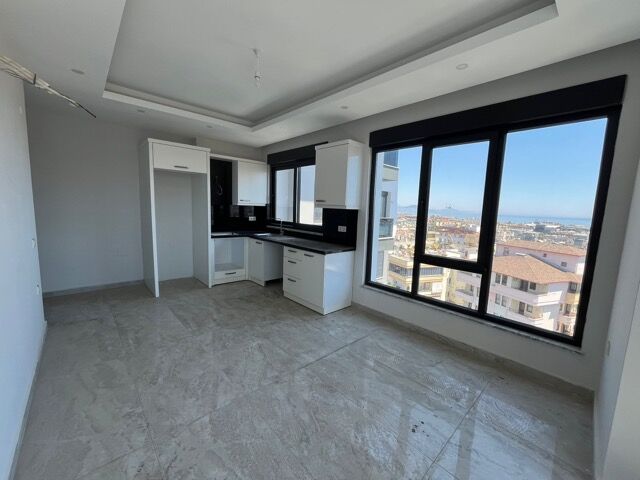 Bright 1-bedroom apartment with full amenities in Alanya. Perfect for investment or living in a scen.