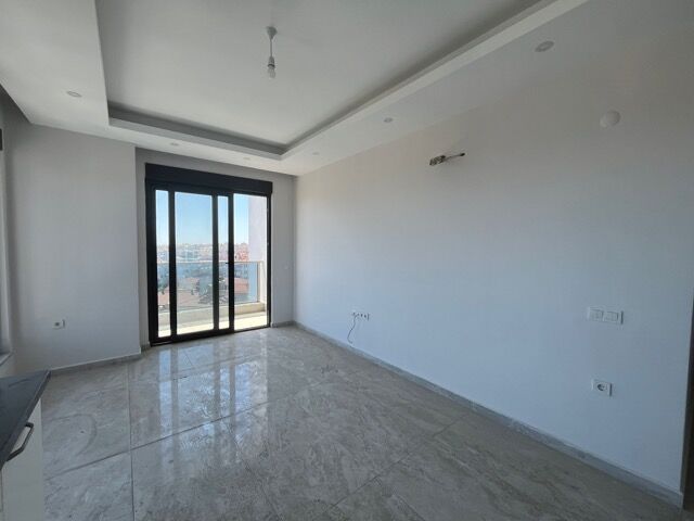 Apartment with full amenities and balcony in Alanya.