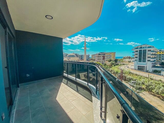 Sea view balcony of modern 2-bedroom apartment in Kargıcak, Alanya.