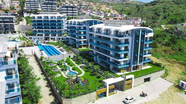 Elegant 2-bedroom penthouse with private balcony and pool in Kargıcak, Alanya. Luxurious amenities a.