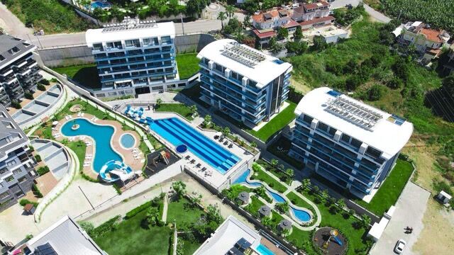 Elegant 2-bedroom penthouse featuring private balcony, swimming pool, and premium amenities in Alany.