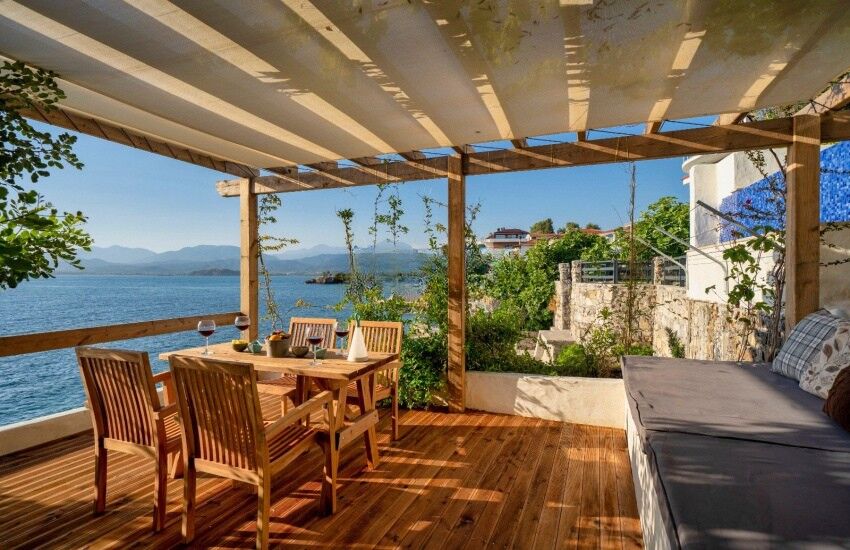 Seafront villa with private pier on Sovalye Island, Fethiye, offering stunning sea views and outdoor.