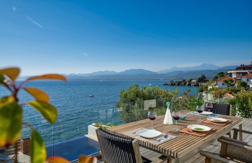 Seafront villa with private pier on Sovalye Island, Fethiye, offering stunning views and luxurious o.