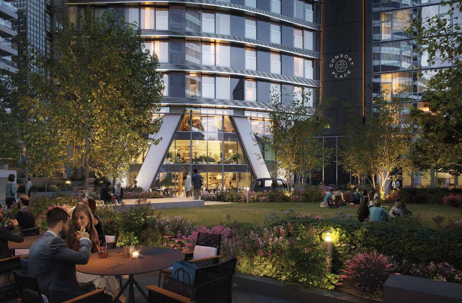 Modern office building in Canary Wharf with outdoor seating area and landscaped gardens.