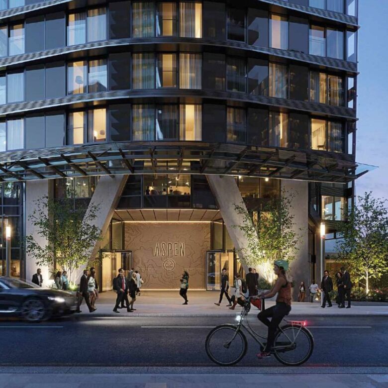 Modern luxury apartment building in Canary Wharf with stunning waterfront views.