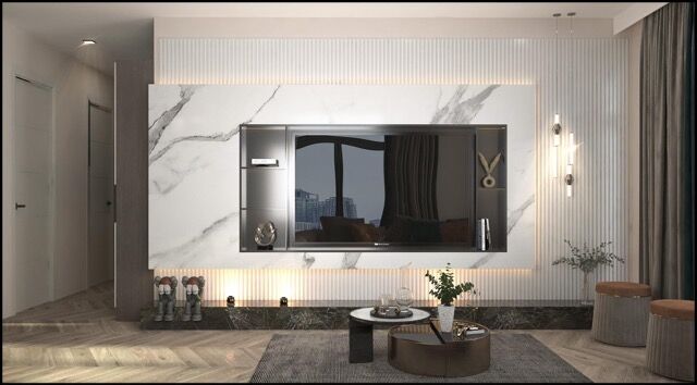 Modern living room with sleek marble wall and flat-screen TV for stylish home entertainment.