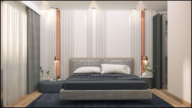 Luxury bedroom with modern decor, cozy bed, and elegant lighting in Mersin property for sale.