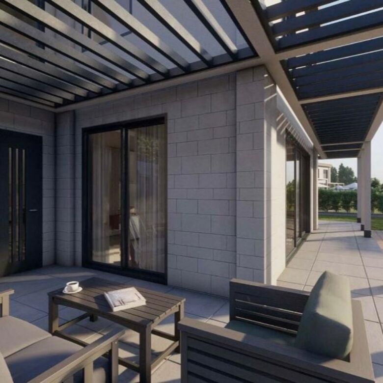 Modern Bodrum villa terrace with stylish outdoor seating and pergola.