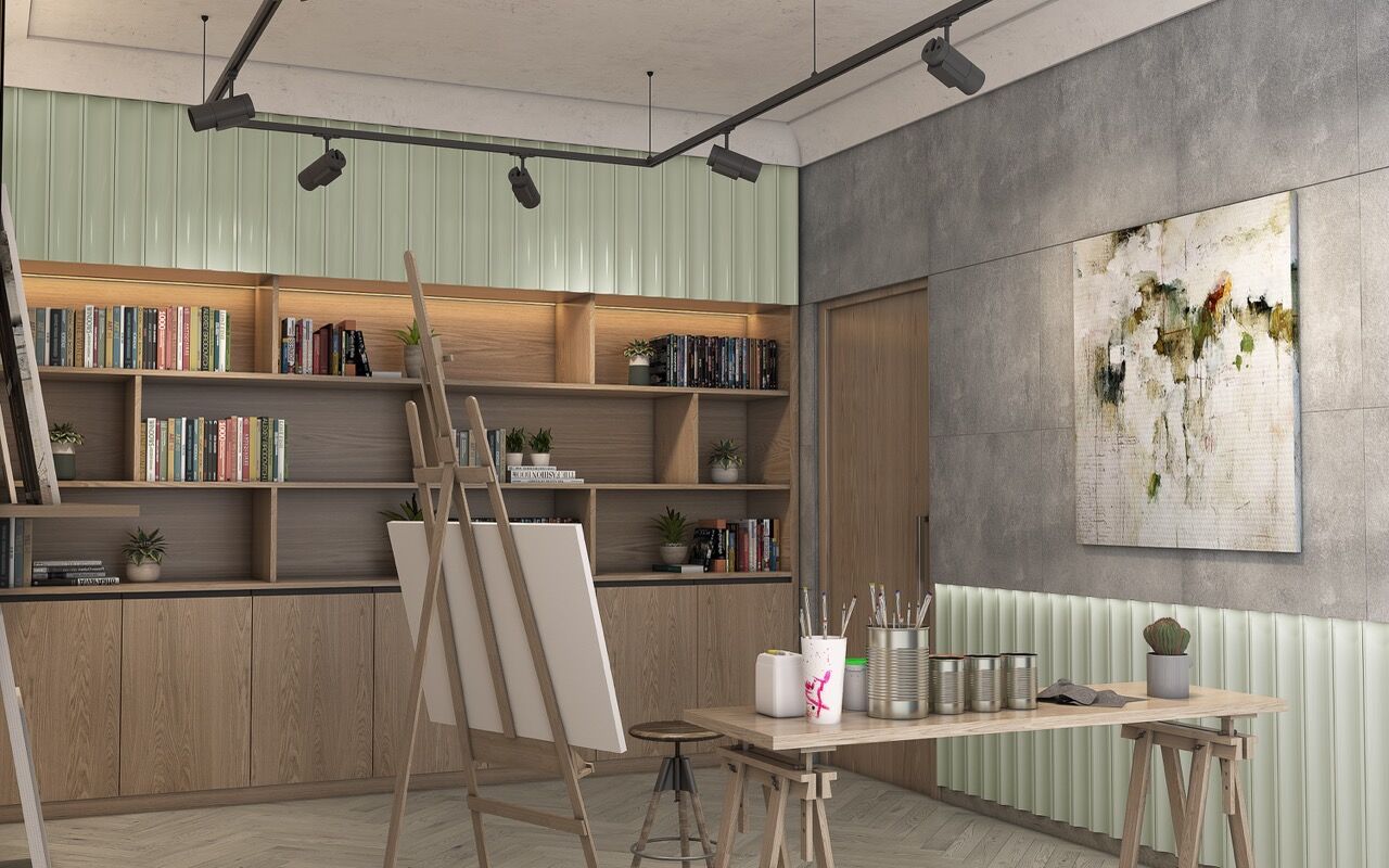 Contemporary art studio with wooden shelves, easel, and painting supplies in a stylish interior.