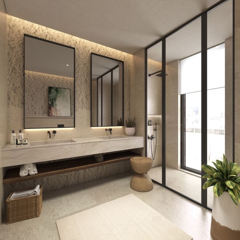 Modern Dubai bathroom with glass shower, elegant mirrors, and contemporary design elements.