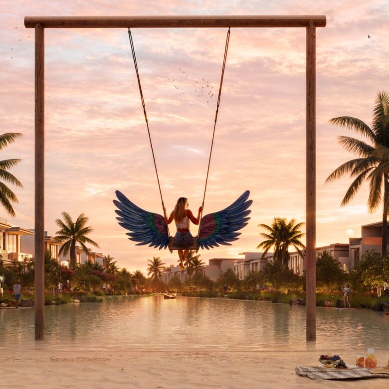 Luxury Dubai island resort with a swing over water at sunset.