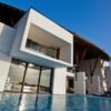 Modern luxury villa with pool in Talawila, Sri Lanka, featuring contemporary architecture and ocean.
