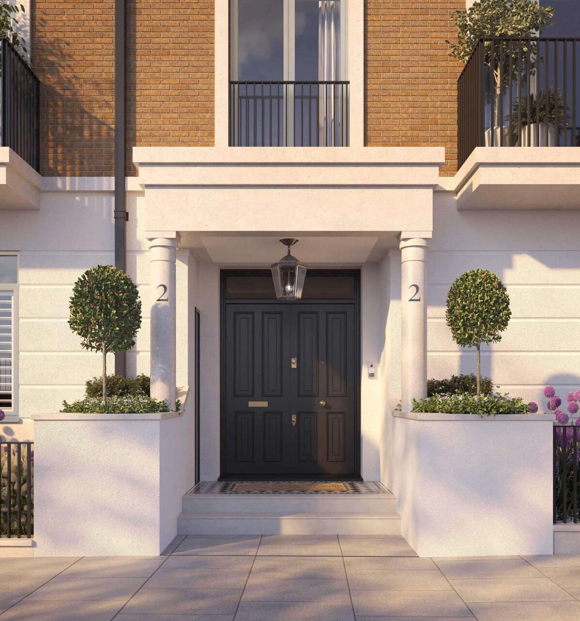 Elegant townhouse entrance with black door and classic design.