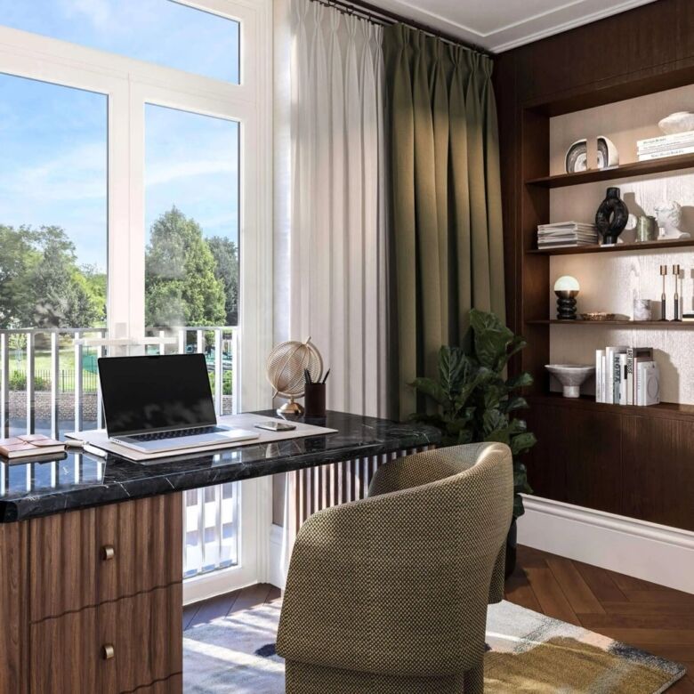Modern home office with large window overlooking the river and lush greenery.