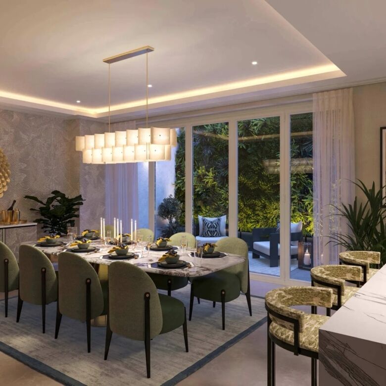 Elegant dining room with modern decor and large windows overlooking lush greenery. Perfect for famil.