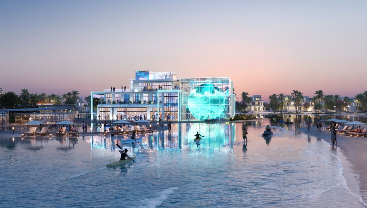 Modern luxury resort on a private island in Dubai with water activities and tropical surroundings.