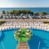 Pool area with sea views and sun loungers in Costa Calma, Ravda.