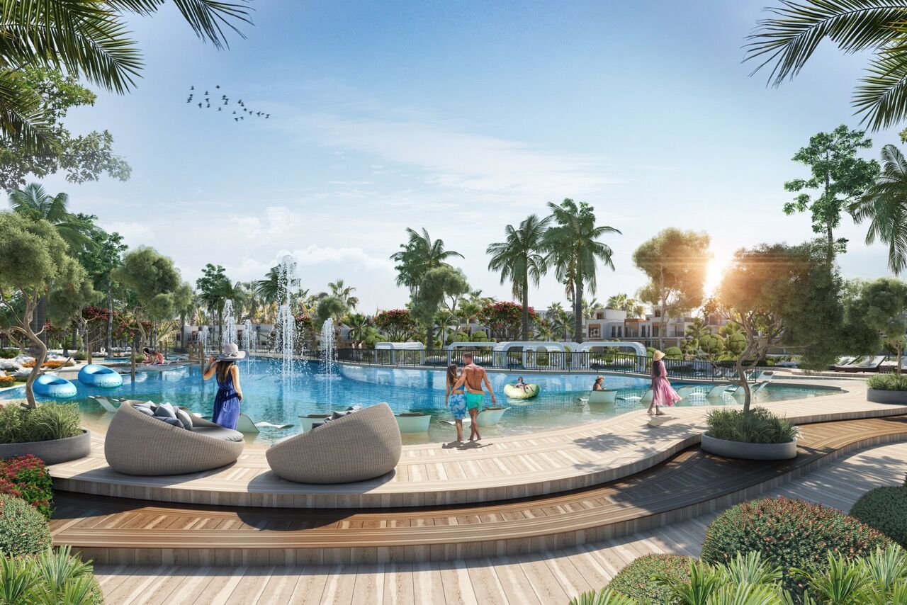 Lagoon-style pool with tropical landscaping in Dubai's Mykonos-inspired community.