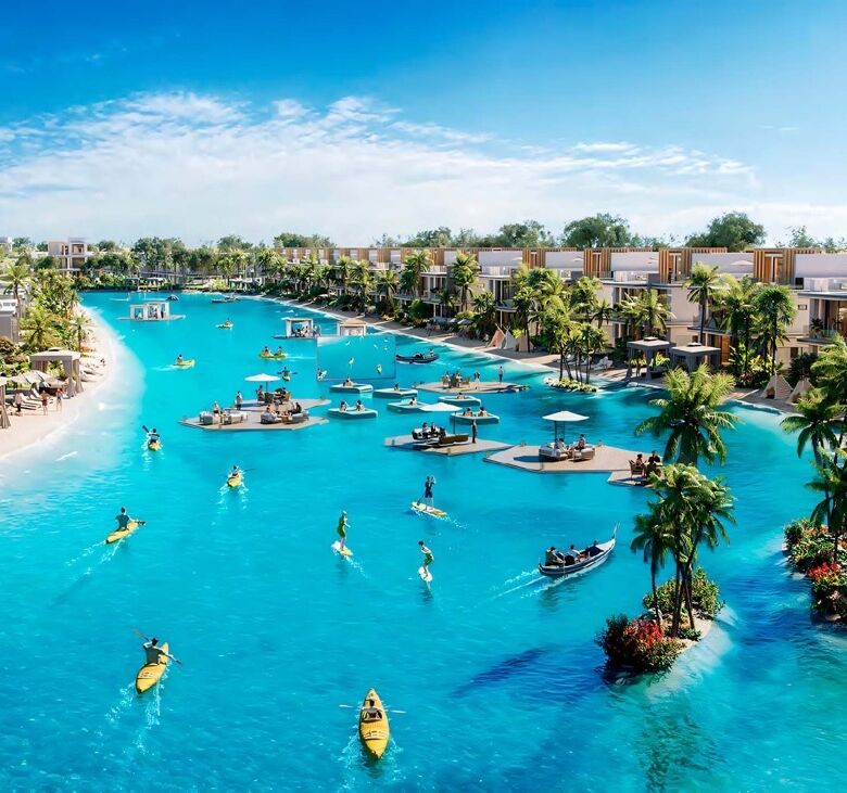 Stunning island-inspired luxury resort pool in Dubai with palm trees and water activities.
