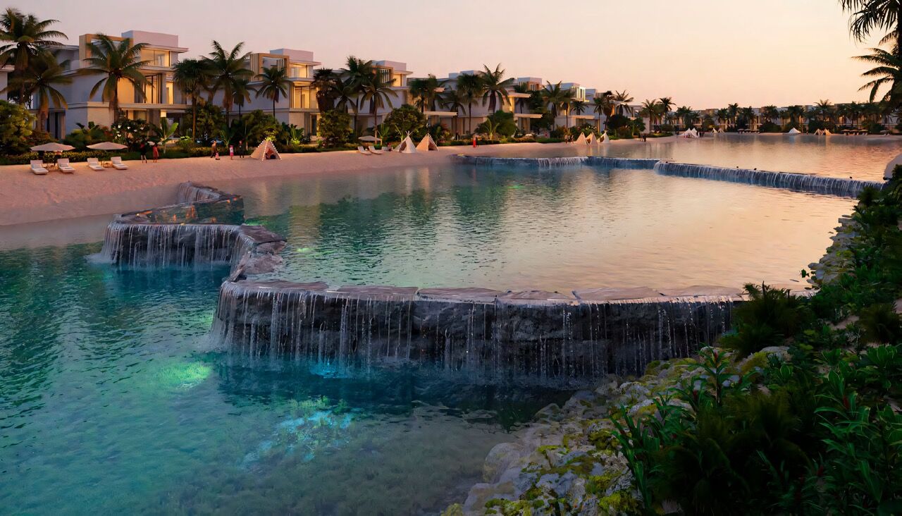 Luxury Dubai Pool with Waterfalls and Tropical Landscape Elegant pool with waterfalls surrounded by lush greenery in Dubai resort.