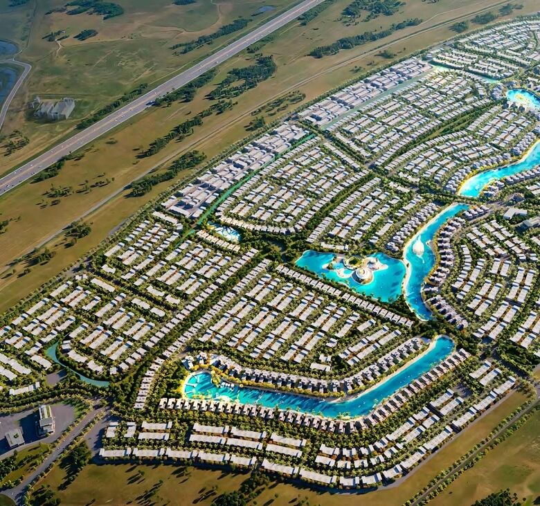 Aerial view of a luxurious private island community in Dubai with waterways and modern villas.