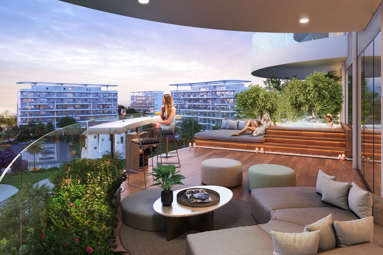 Modern lagoon-facing apartments in Dubai with spacious balcony and scenic water views.