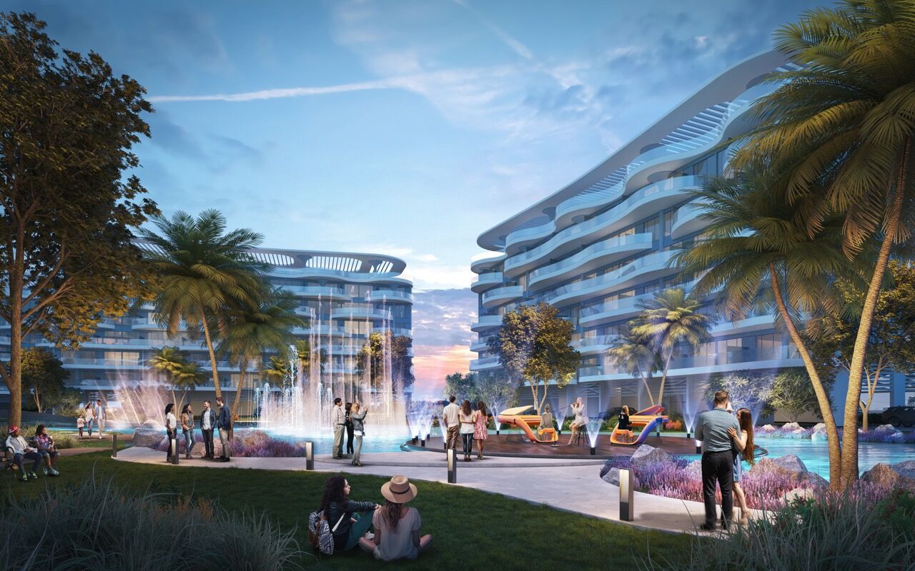 Modern lagoon-facing apartments in Dubai with waterfront views and lush landscaping.