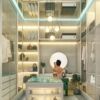 Modern lagoon-facing apartment interior with stylish storage and lighting.