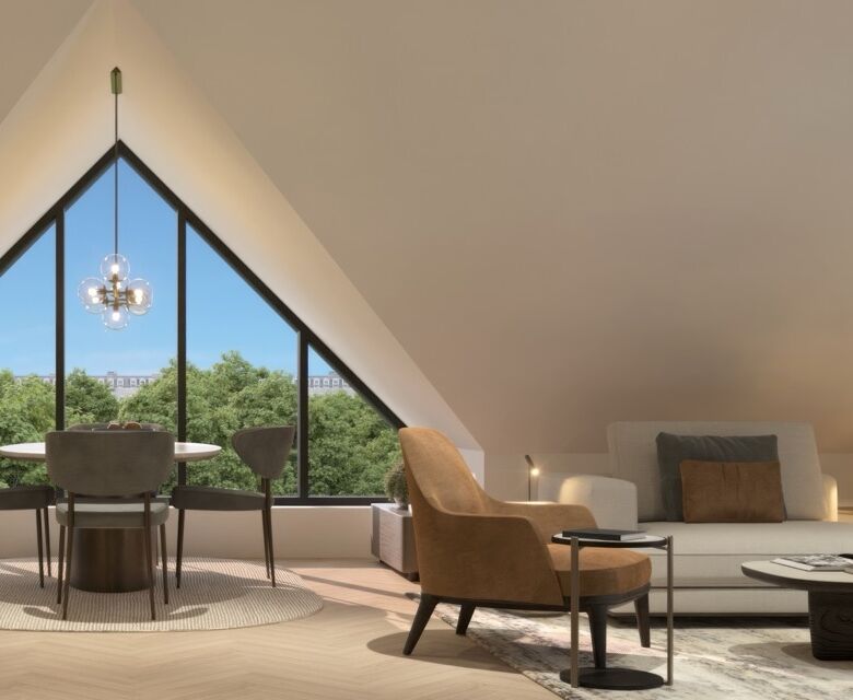 Spacious living room with modern furniture and large windows overlooking lush greenery.