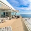 Spacious balcony of a luxury 3-bedroom apartment with sea views in El Higueron Resort, Fuengirola, S.