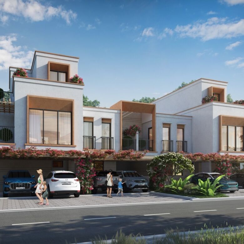 Contemporary Greek-style villas in Dubai with lagoon views and lush landscaping.