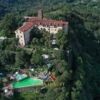 Castle in Piedmont with historic architecture and scenic surroundings.