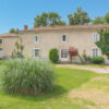 Charming 5-bedroom house for sale in Louin, France, with spacious gardens and classic architecture.