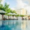 Pool area with sun loungers and umbrellas at Tarsis Nova, Sunny Beach.