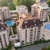 Apartment complex with pools and green spaces in Sunny Beach, Bulgaria.