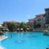 Outdoor swimming pool at Vineyards SPA Resort near the sea.