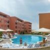 Pool area at Sunny Day 6, Sunny Beach with sun loungers and umbrellas.