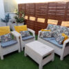 Comfortable outdoor seating set with cushions in a private garden in Torrevieja.