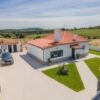 Modern house in Rio Maior with spacious driveway and lush garden.