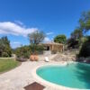 Elegant villa featuring a private swimming pool and scenic landscape views. Perfect for luxurious li.