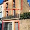 Elegant apartment with courtyard and commercial space in historic building.