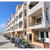 Apartment building in Formentera del Segura with balconies and parking.