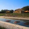 Charming farmhouse with pool near Siena and Grosseto, surrounded by scenic countryside and lush gree.