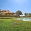Elegant Tuscan villa with lush olive groves and outdoor pool for relaxation and tourism. Perfect for.