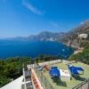 Stunning view of Capri and Positano from an elegant seaside residence. Perfect for luxury living and.