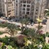 Modern apartment with lush garden views in Al Baron Compound Cairo.