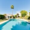 Beautiful swimming pool with lush garden in Marbella Costa del Sol.