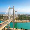 Scenic view of a bridge over turquoise waters in Karystos, Evia, ideal for land investment or develo.