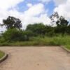 Beautiful land plot in Christ Church with lush greenery and clear skies.