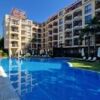 Modern 1-bedroom apartment at Harmony Suites Sunny Beach with pool access and resort amenities.